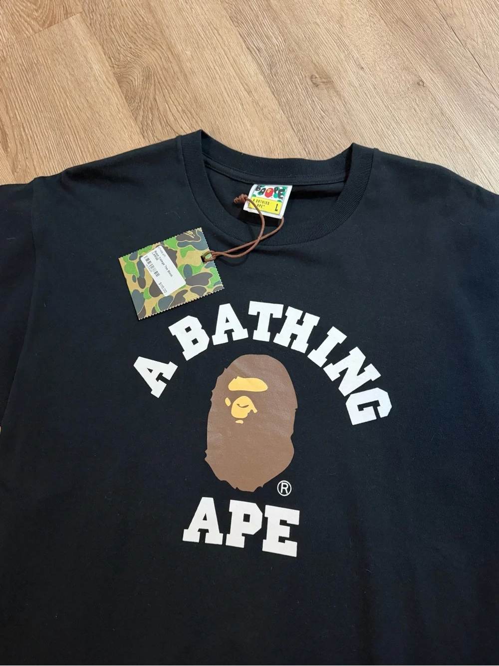 Bape college men’s T-shirt brand new never worn still has tags.